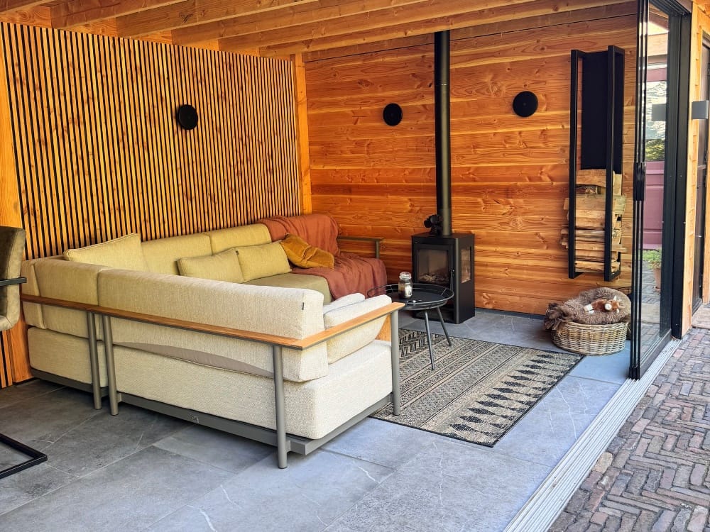 tuinrenovatie houtkachel veranda buitenleven arnhem noord